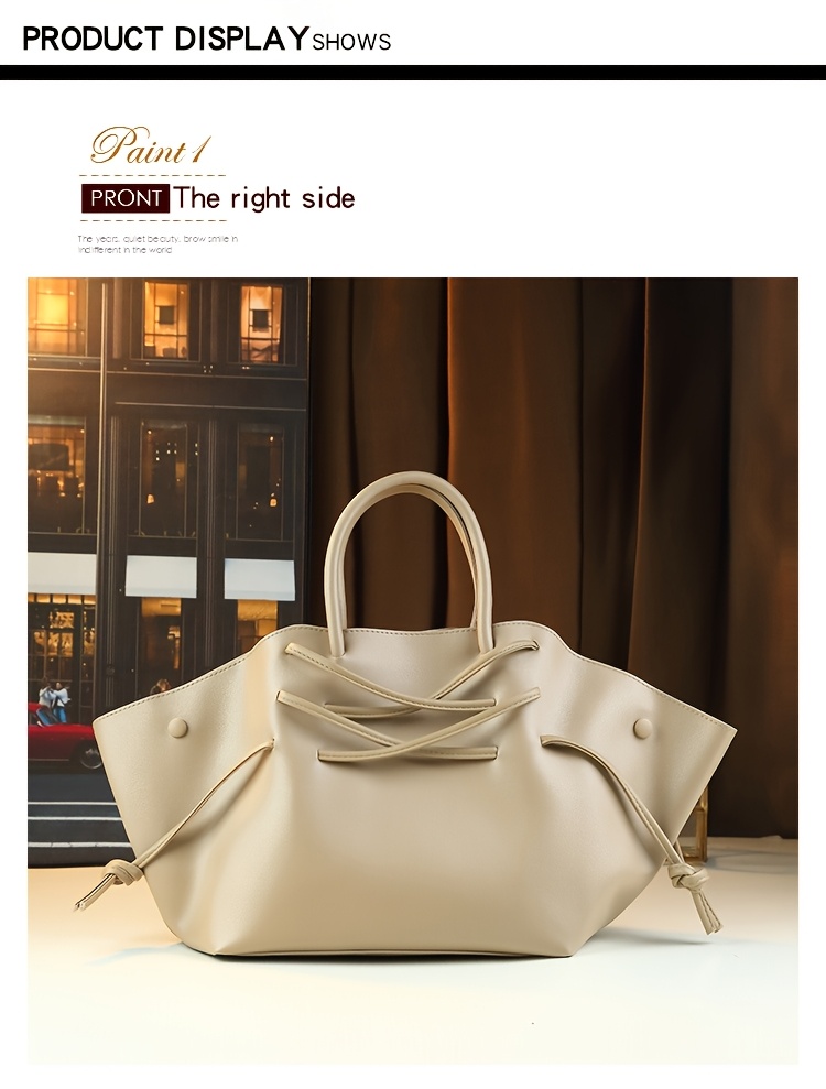 Black Drawstring Tote Bag showing removable strap