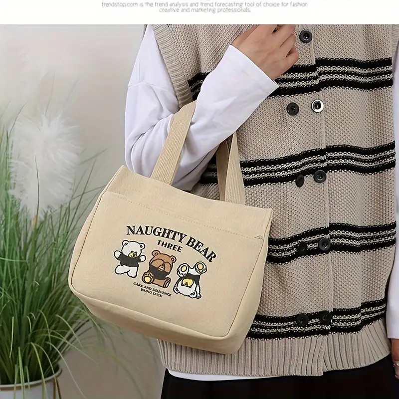 stylish minimalist tote bag with print lightweight zippered closure fixed shoulder straps cream white khaki black and casual casual tote bag material details 5
