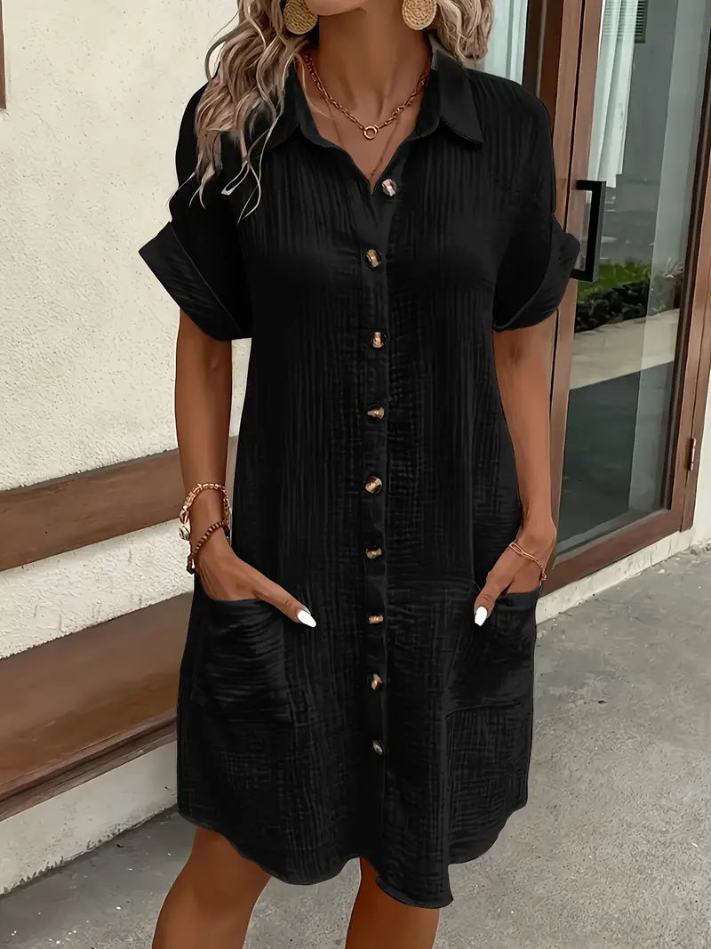 a minimalist white shirt dress made of breathable featuring a sharp collar design and buttons that add a touch of details 18