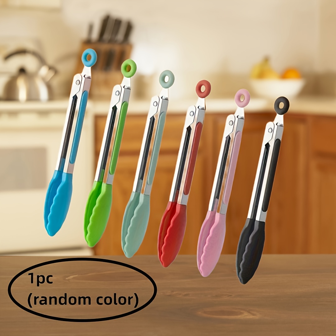 A Stainless Steel Food Tongs for Outdoor Grilling, Perfect for Handling Meat And Steaks, Featuring Heat-Resistant Nylon Grips - Ideal for Barbecues, Buffets, And Outdoor Cooking - Compact And Easy to Carry