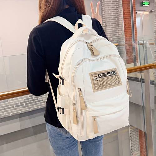 large capacity backpack durable nylon backpack two way zipper closure adjustable shoulder strap comfortable carrying multiple pockets lining hand washable school backpack