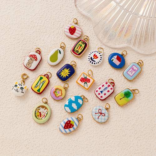 a stylish and minimalist commuting pendant featuring enamel painting of trees cherry mushrooms green and flowers part of of pendants and fruits suitable for fashion additions like keychains