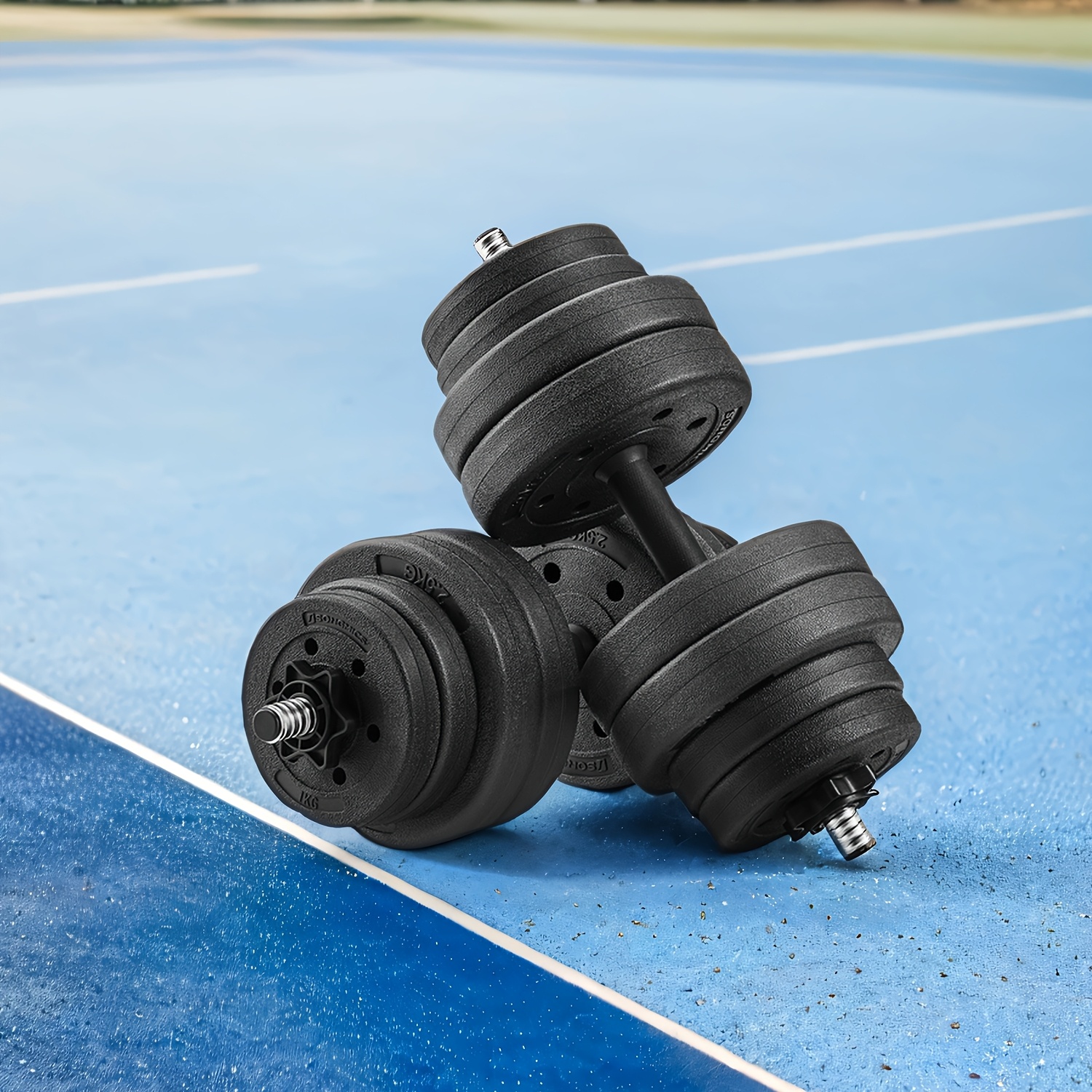 A Pair Of Versatile Dumbbells That Configured To Provide 2 Distinct Weights, Amounting To 30 Kg