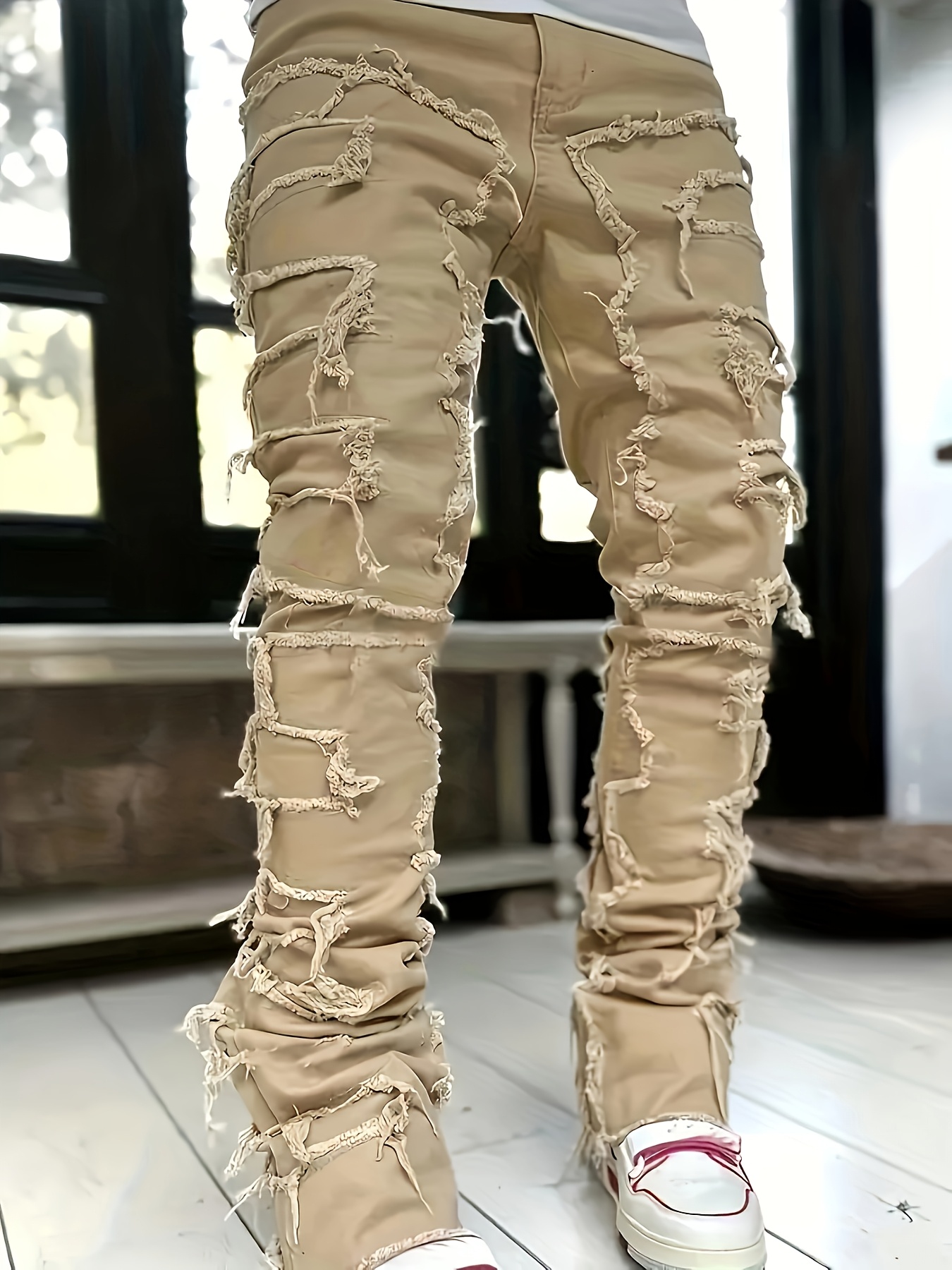 stretchy edgy and distressed   hem stacked denim jeans     fit slightly flared casual pants
