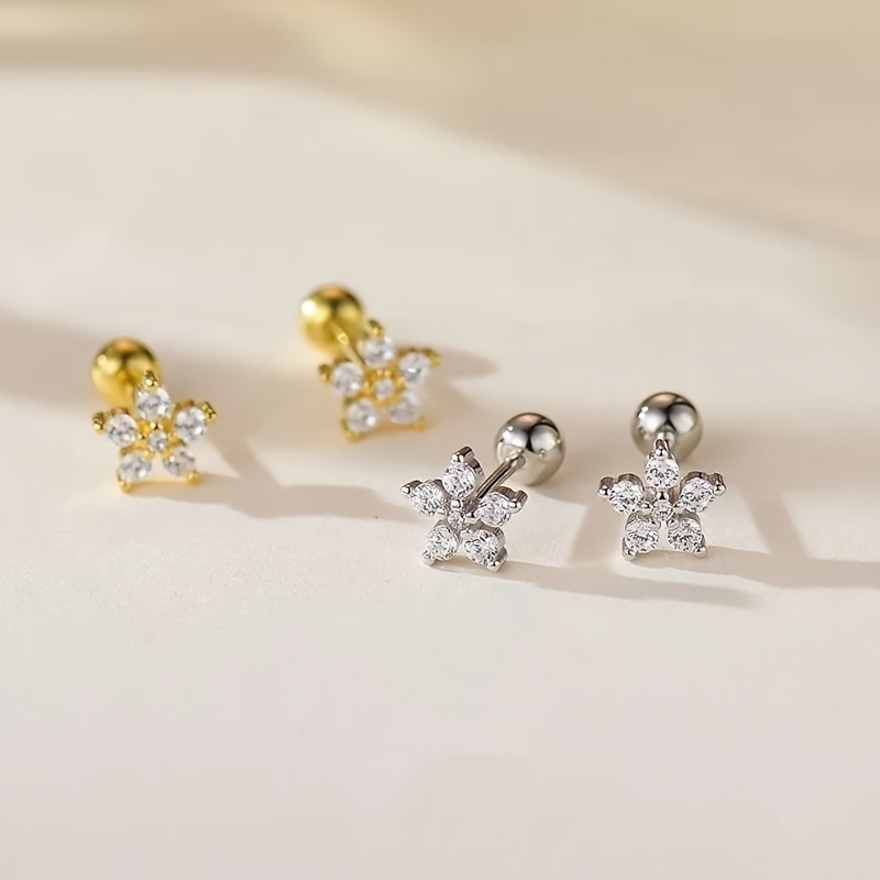 

A Pair Of Delicate And Cute Stainless Steel Screw Ear Studs With Inlaid Synthetic Zirconia Flower Decorations.