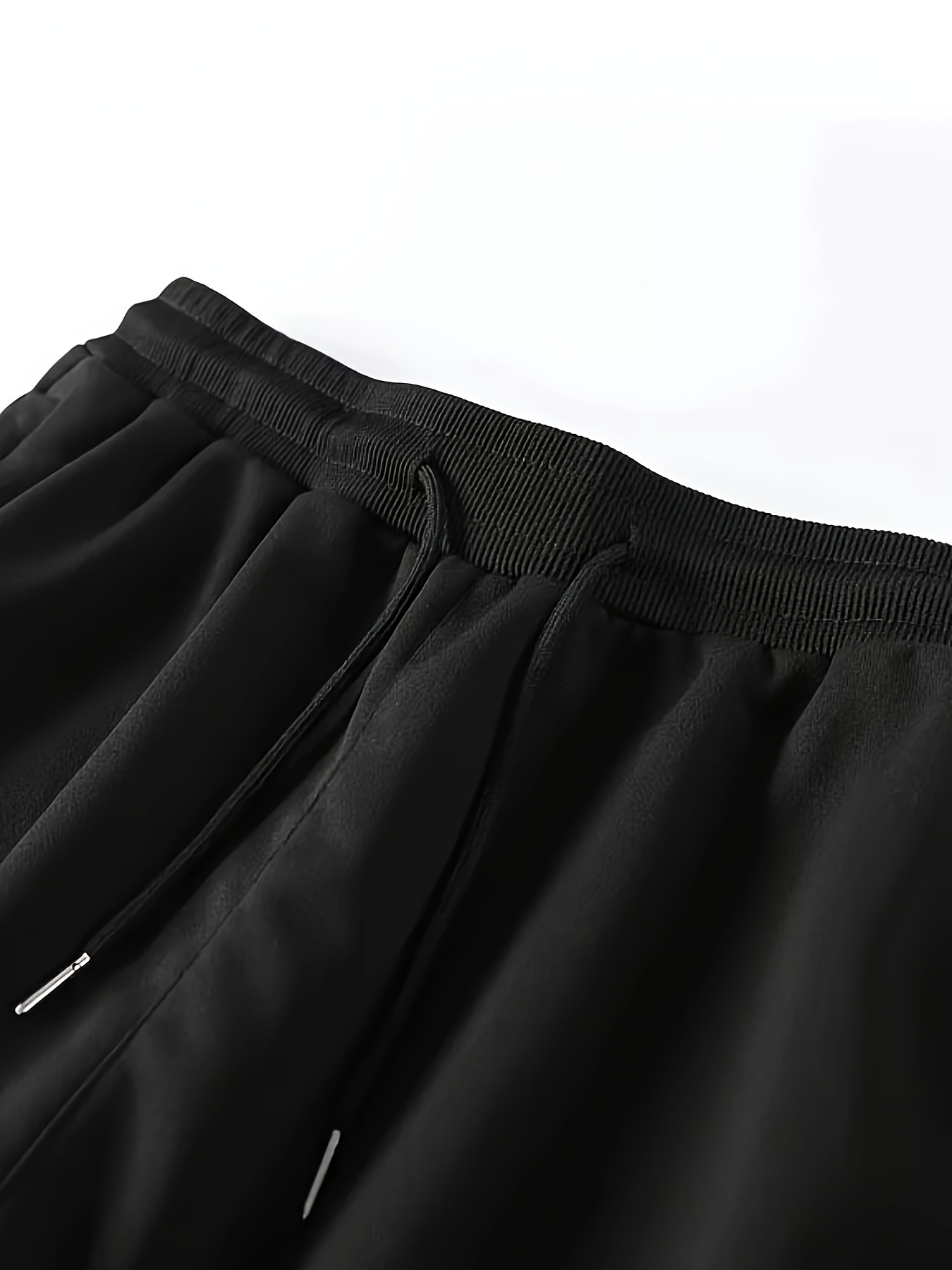 Four-piece set of new Men's casual sports pants, perfect for spring and summer. Made with 100% polyester quick-dry fabric that prevents Light Beige irritation after intense sweating and is durable. Features a slight stretch technology for unrestricted movement during jumping and turning, allowing full freedom in any activity. Ideal for gym workouts, outdoor hiking, daily commuting, rock climbing, city cycling, and fitness training