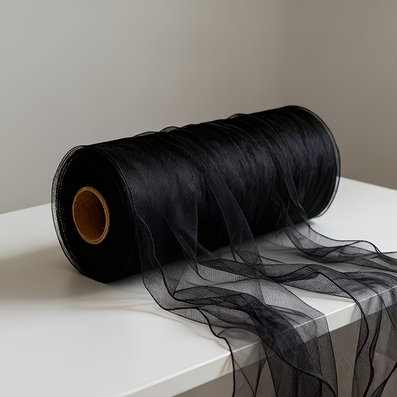 item picture   in 50  4 inches extra long roll and 30m 1191 inches   roll this elegant semi transparent to transparent   mesh tulle decoration is a versatile hanging ornament and wedding arch decoration drapery fabric