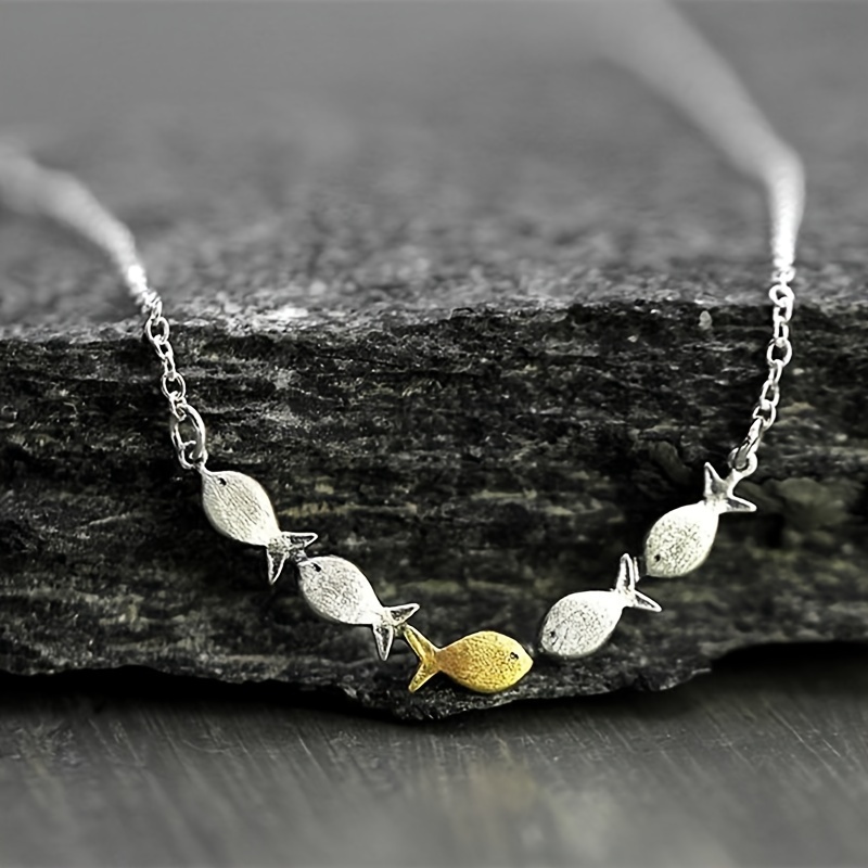 

A Simple Fish Necklace, A Creative And Unique Piece Of Jewelry For .