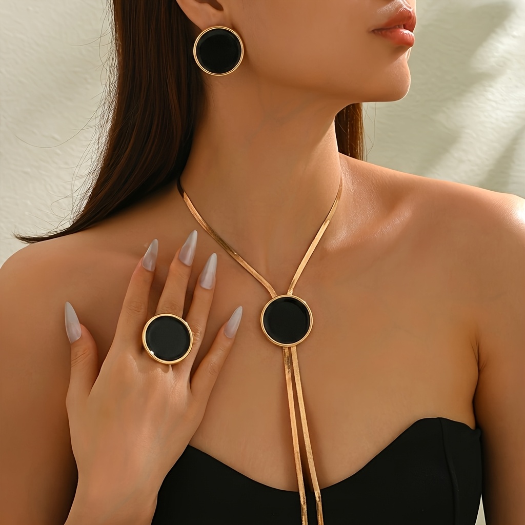 TEMU Conjunto de 3 piezas de joyería para mujer: collar, aretes y anillo, diseño minimalista en negro y dorado, collar largo con de Y y cadena de