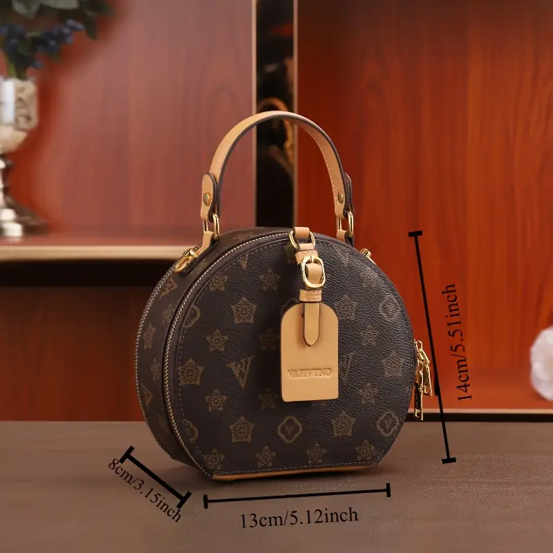 vintage floral print round handbag for women elegant detachable strap zipper closure polyester lined white leather like material with hardware and decorative tag Product details 1