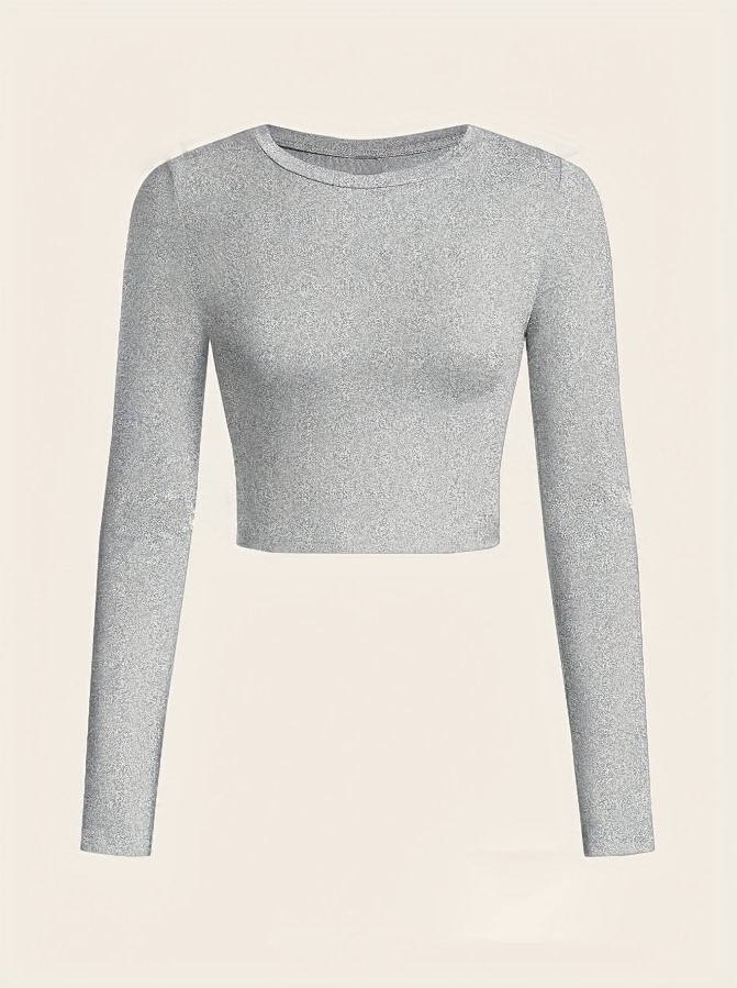 A women's long sleeve crop top sold by 100 Spartans