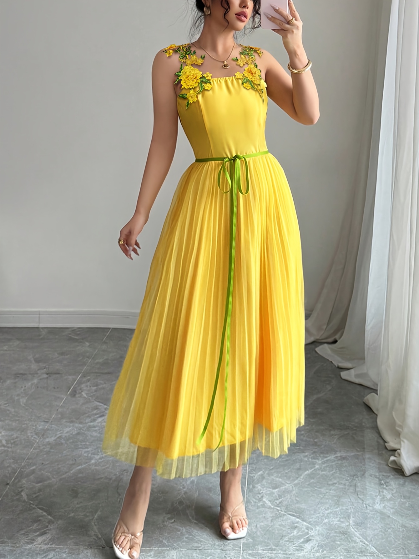 a stylish elegant yellow a line midi dress delicate shoulder