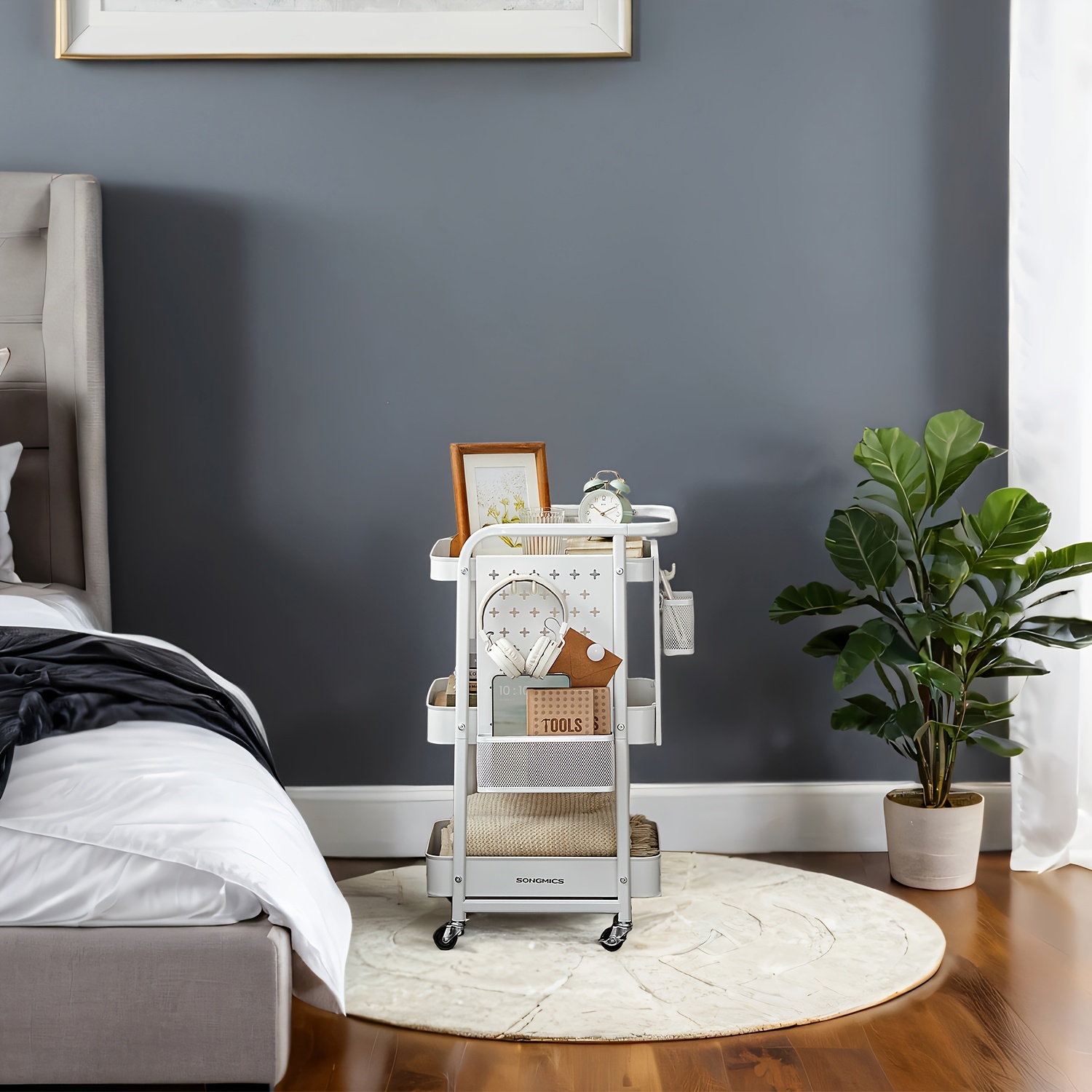 A Rolling Kitchen Cart Featuring 3 Metal Mesh Shelves, Designed For Serving, With 2 Detachable Pegboards, 2 Hanging Baskets, And 4 Hooks, All In