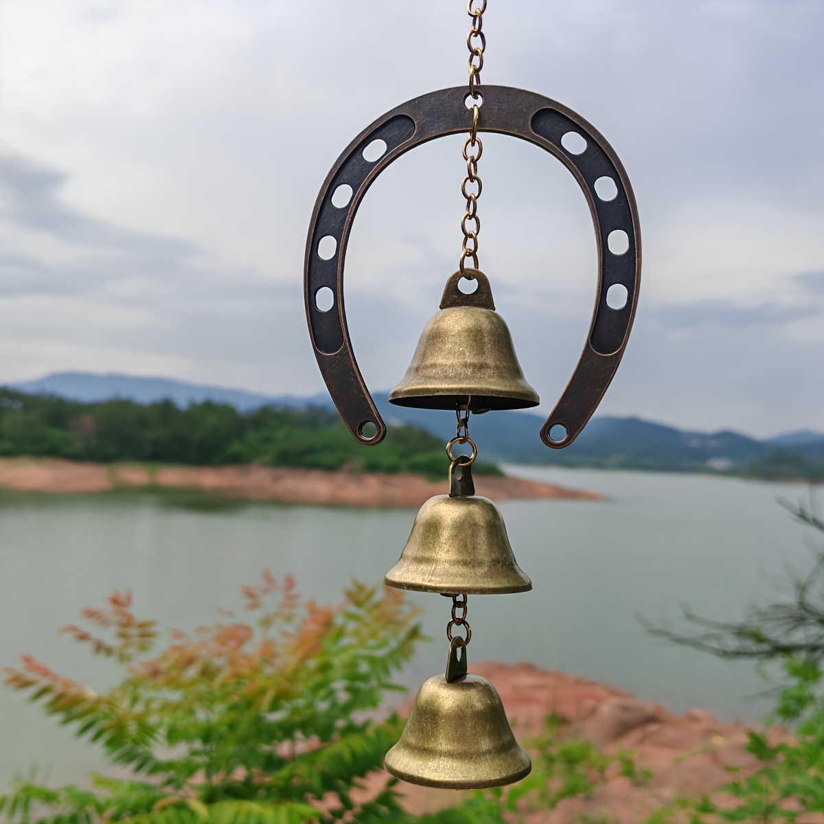 Image of A Large Horseshoe-shaped Wind Chime , Featuring A Bell And A Decorative Chain, Perfect For Hanging Or Balcony To Create A Calming Sound, Ideal For Enhancing Outdoor Decor