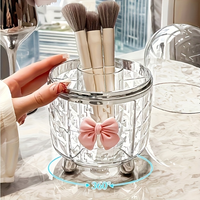 360 degree rotating makeup organizer with clear lid bathroom vanity organizer space saving countertop storage for makeup brushes lipstick eyeliner no power needed durable plastic construction   home or decorative bow accent sturdy brush holder beauty enthusiasts Product details 1