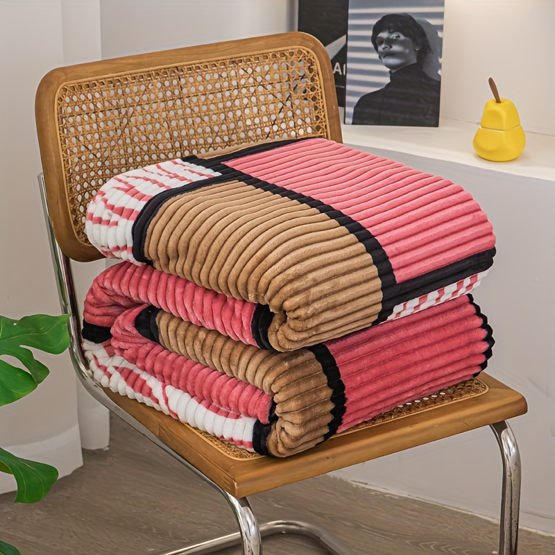 a magical fluffy striped blanket with printed   made of fleece   the office or a nap details 11