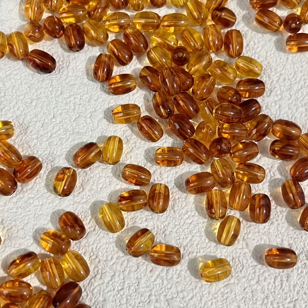 100 Colored Oval Beads for Jewelry Making, 6x9mm