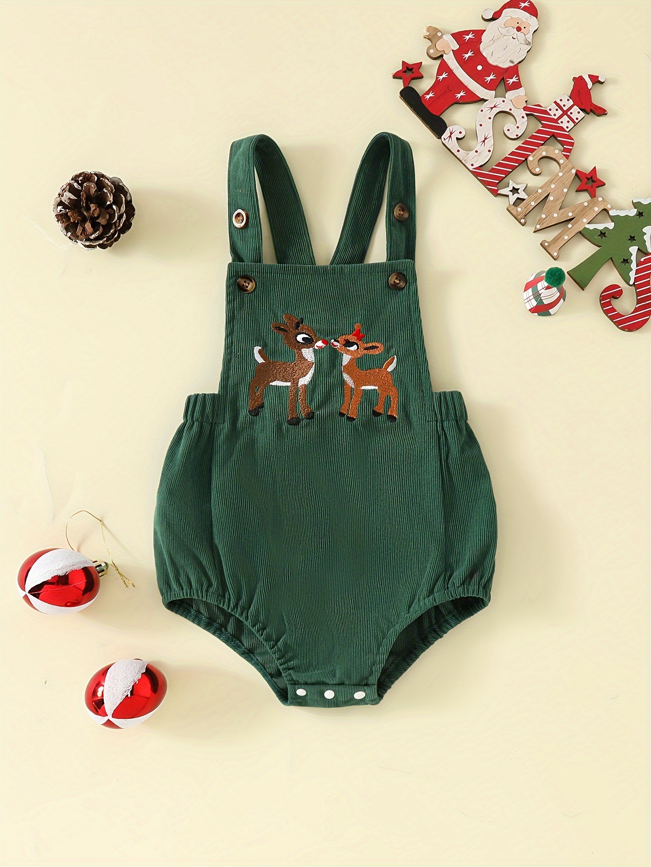 Dark green romper with embroidered deer