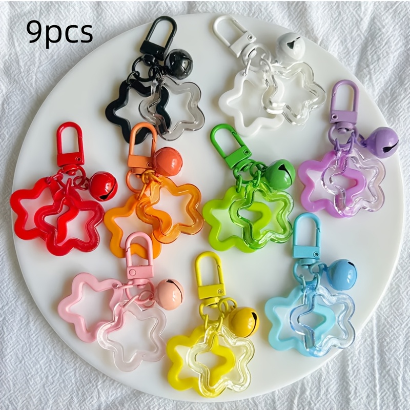Image of 9pcs Set Of Star-shaped Hollow Keychains, Made Of Acrylic. Suitable For Bag Accessories, Birthday Gifts, And Holiday Parties