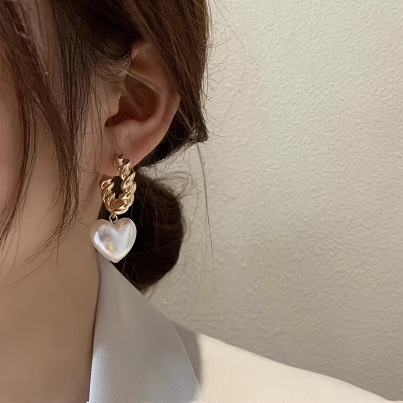 TEMU 1 Pair Of Fashionable Women's Twist Heart Earrings, Suitable For Women To Wear , Parties/, Travel, Vacations And Other Occasions, As A Holiday