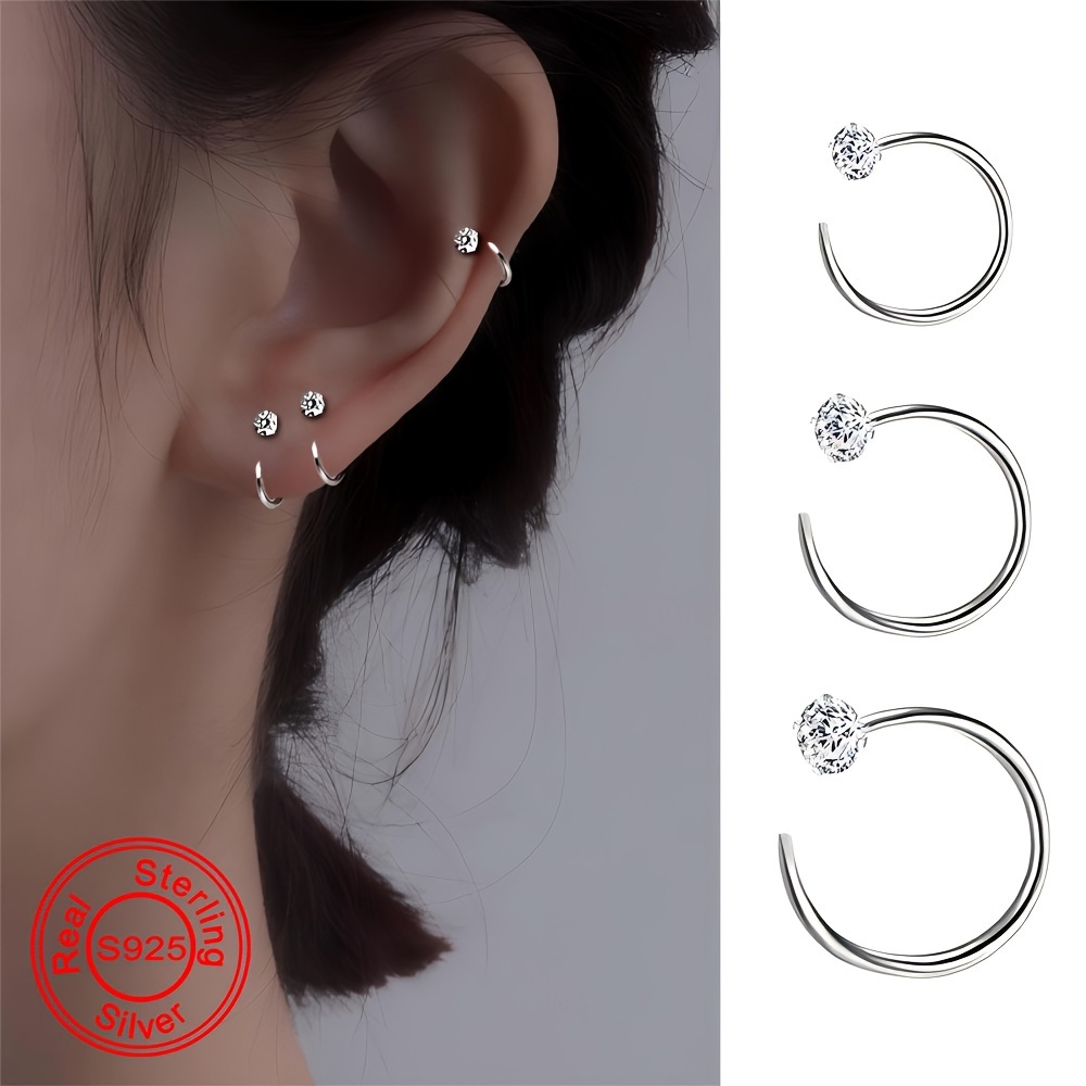 

Simple And Mini Earrings For Of S925 Silver With 4 Holding Zirconia Stones, A Of Luxury And . (silvery Net Weight: 0.52g-0.55g-0.63g)