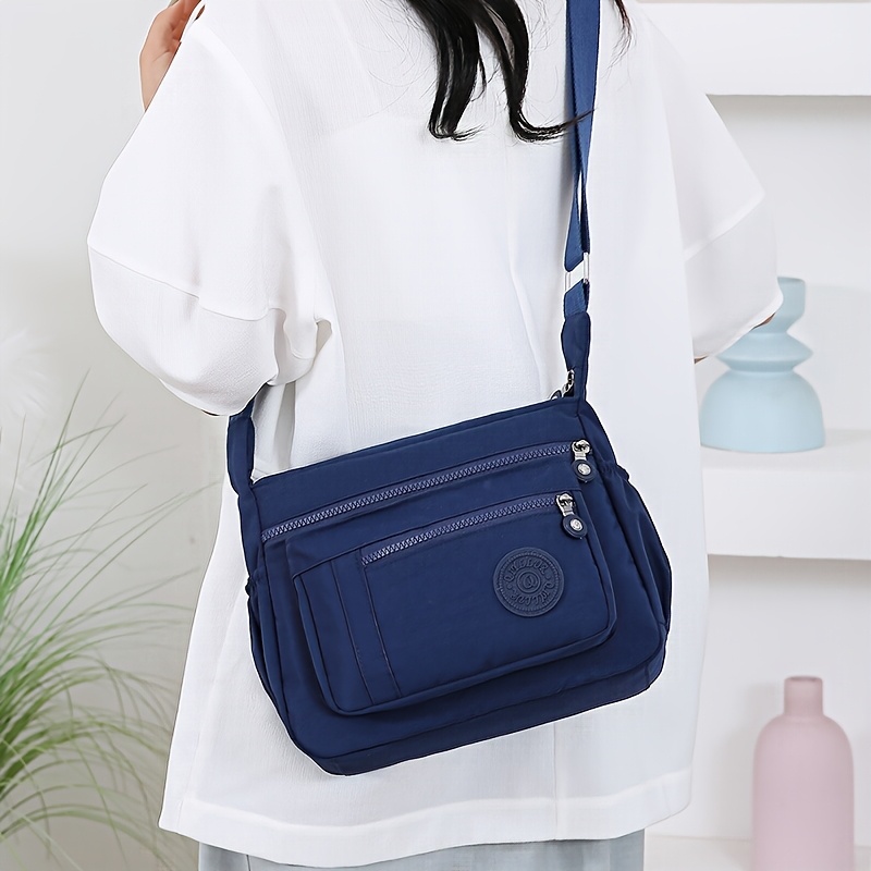 large capacity oxford fabric multi pocket drawstring crossbody bag simple womens shoulder backpack details 2