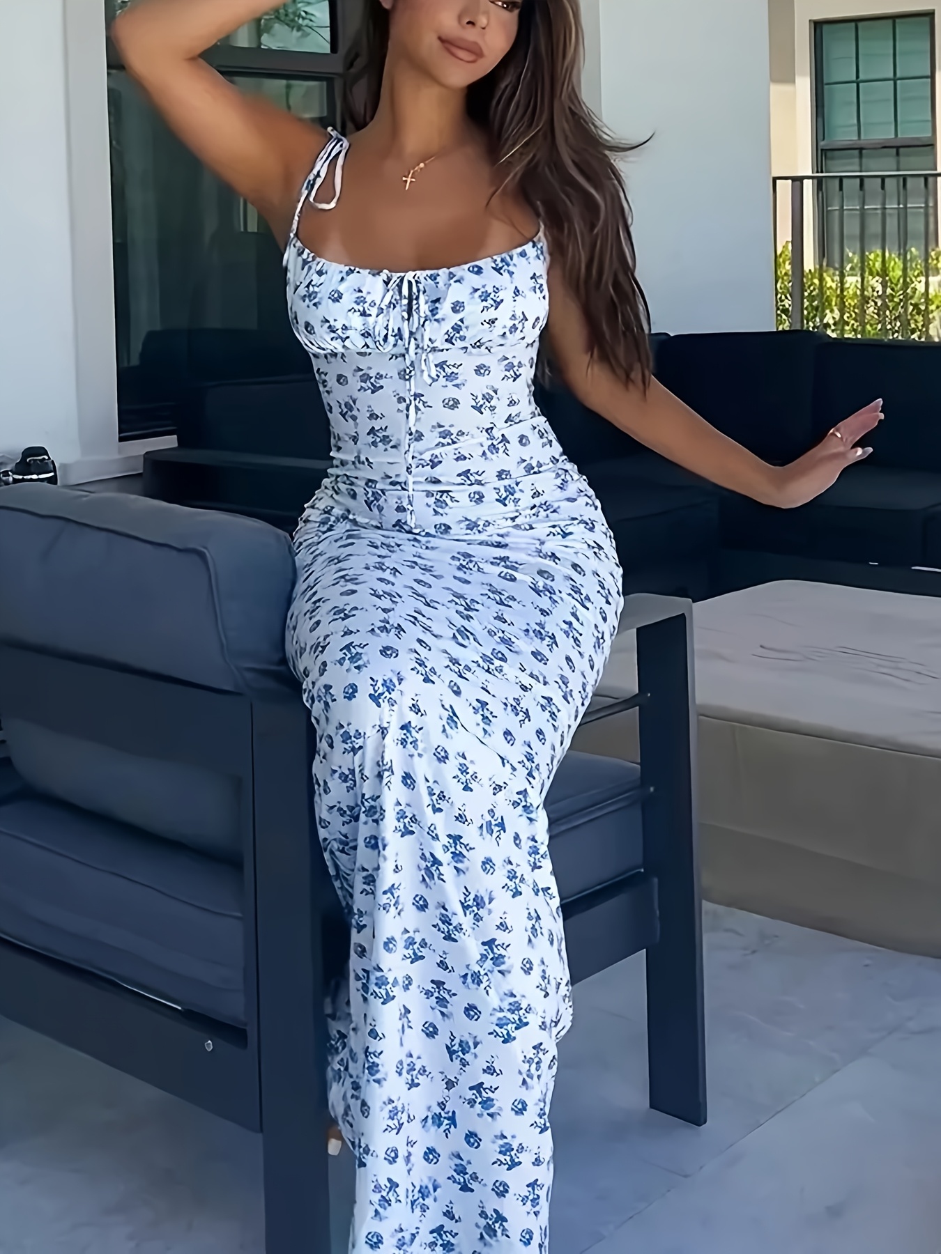a long floral print dress with thin straps featuring self tie straps and a mermaid design   evening events vacations and casual wear