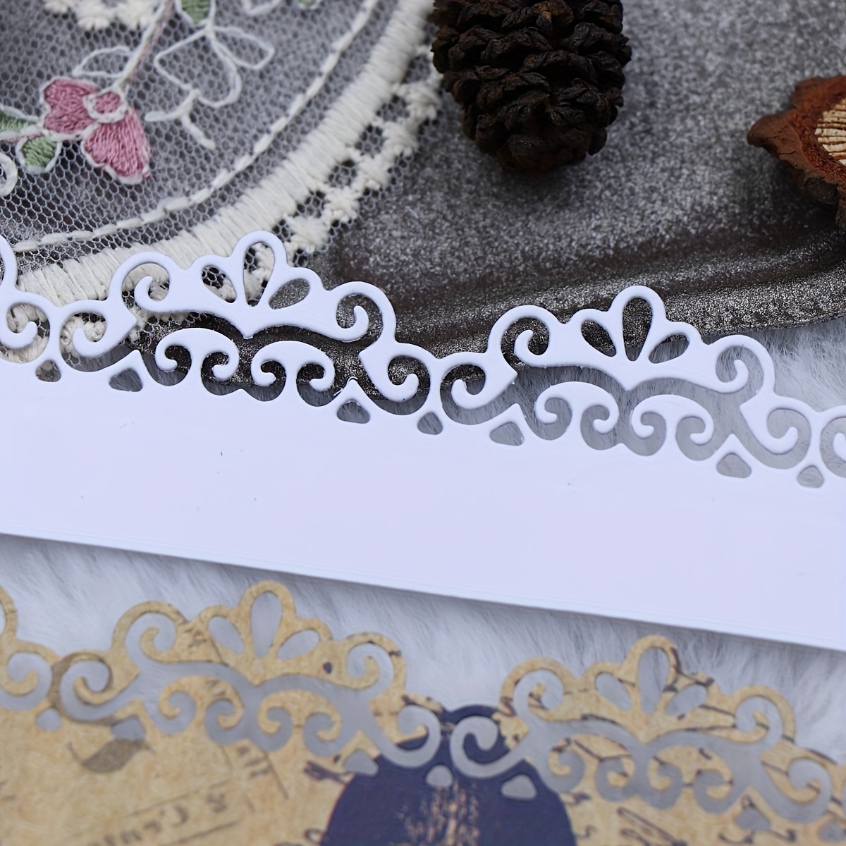 

A Cutting And Embossing Knife Mold With Lace And Golden Edges