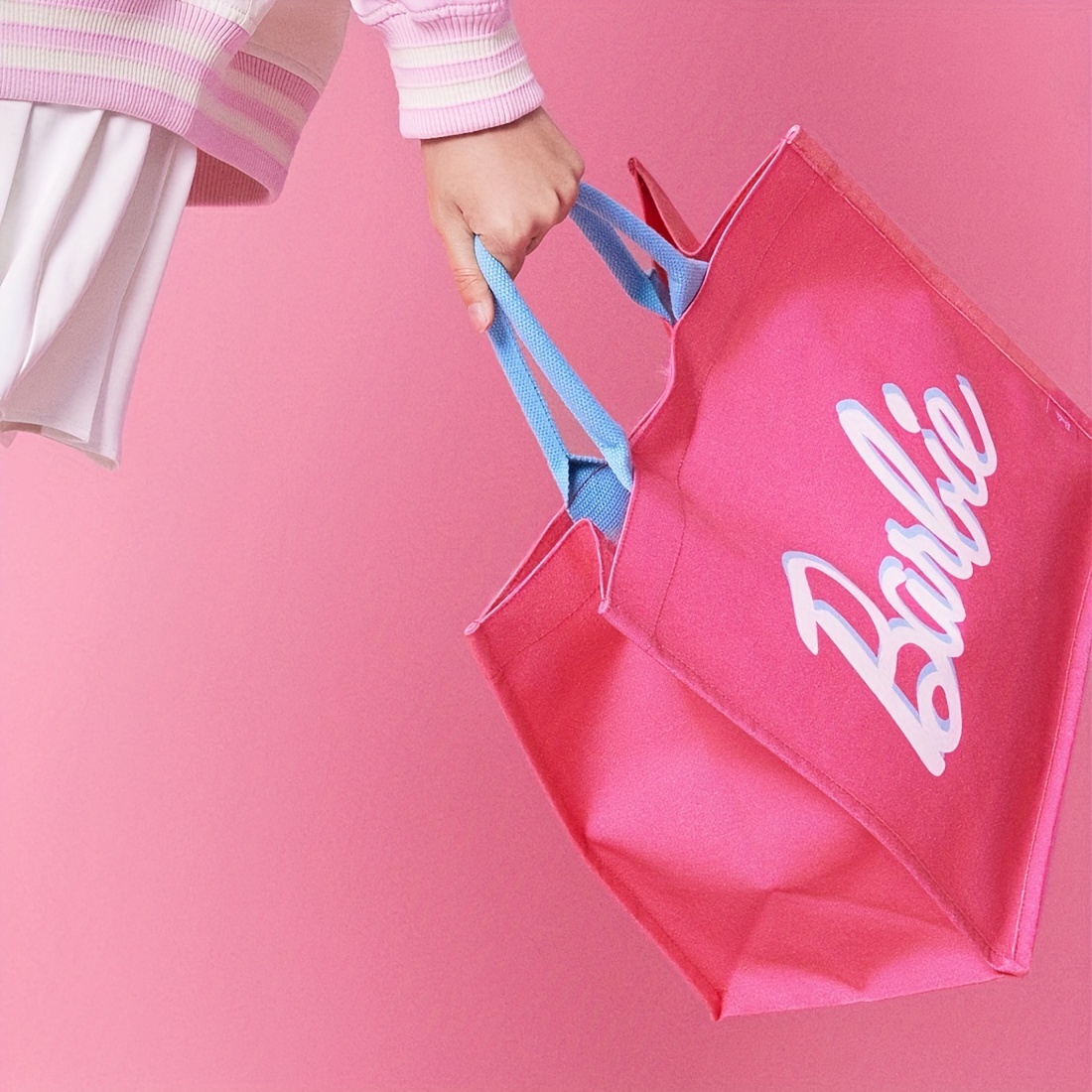 

MINISO Barbie Collection Sac Fourre-Tout Élégant Rose, Tissu Lavable en Machine avec Fermeture à Sangle, Utilisation Quotidienne