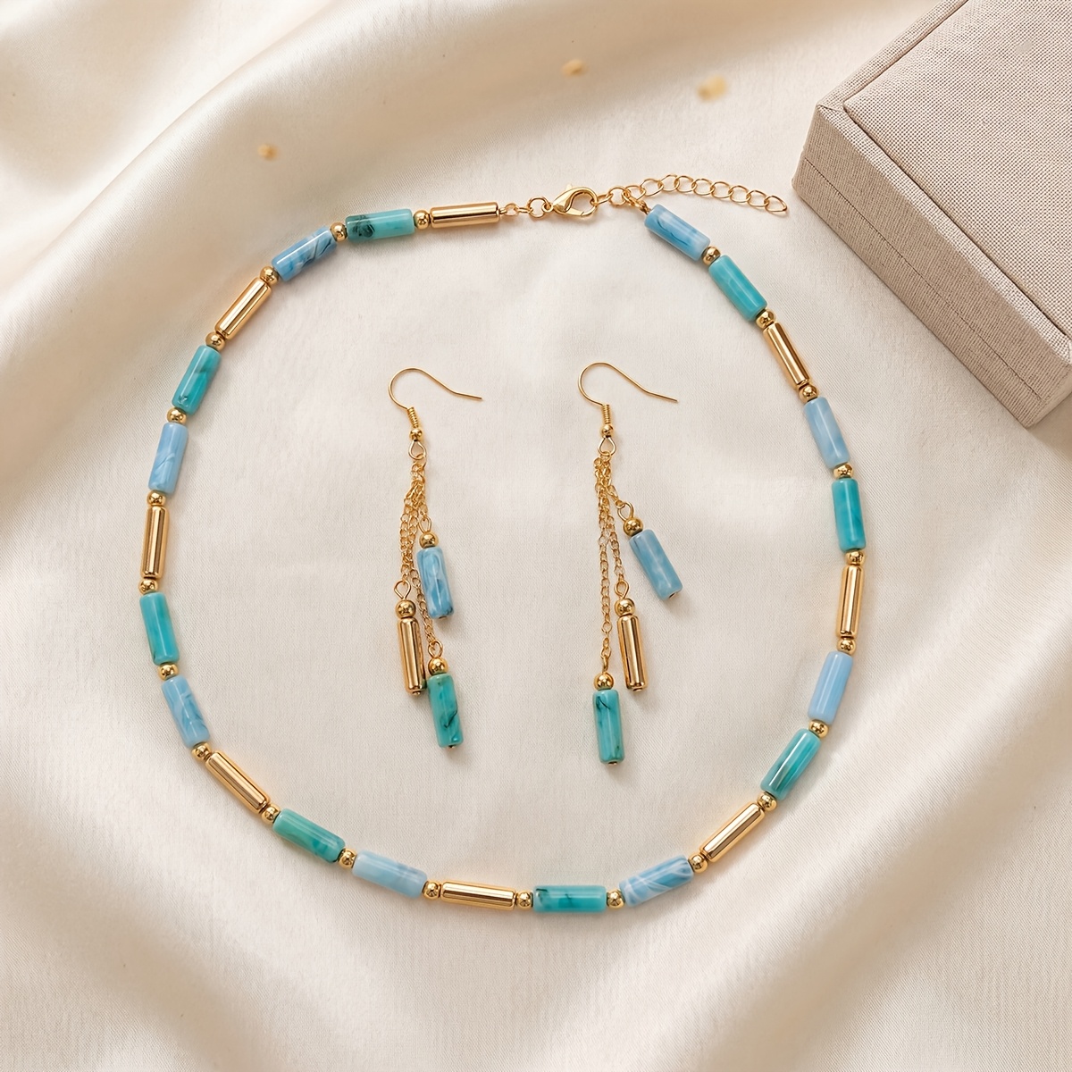 TEMU A Two-piece Women's Jewelry Set Featuring A Stylish Necklace And Earrings For Autumn And Winter. It Includes Pink And Orange Long Cylindrical
