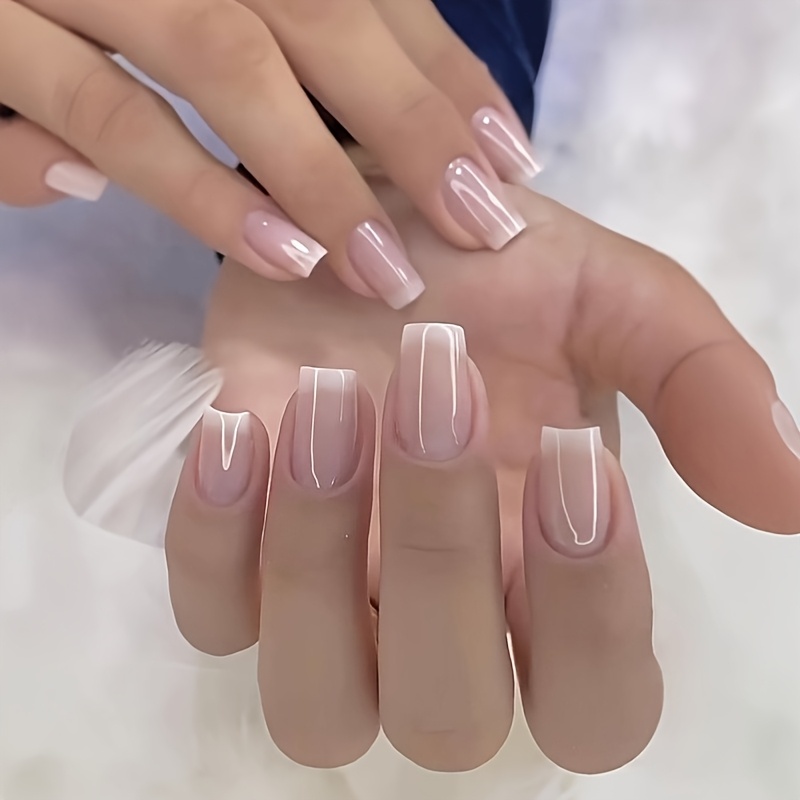TEMU 24 uñas postizas trapezoidales de estilo medio en polvo nude . Manicura con línea sonriente blanca . Uñas prensadas. Pegatinas de uñas