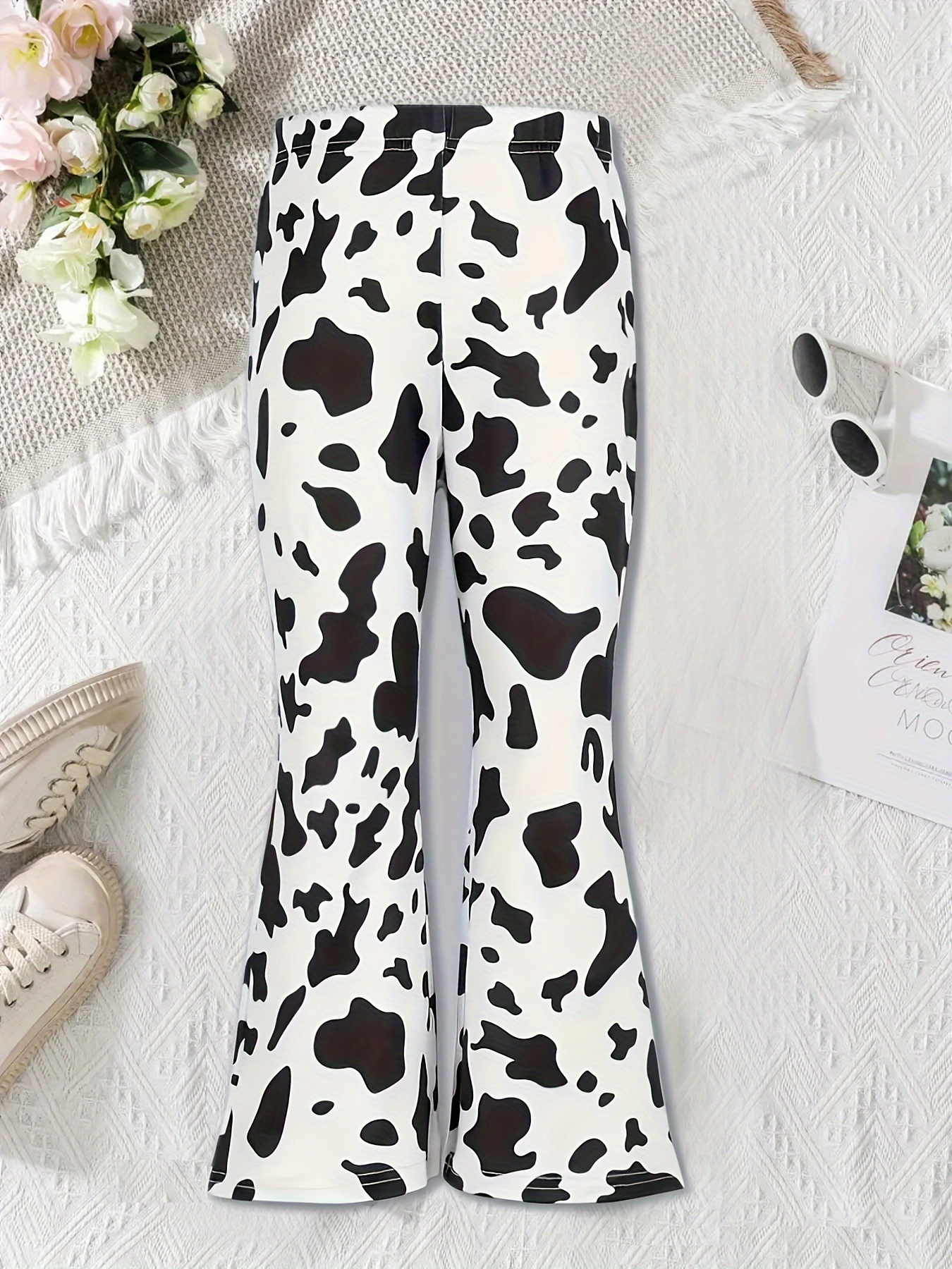 bell bottom pants cow print sold on Temu United States