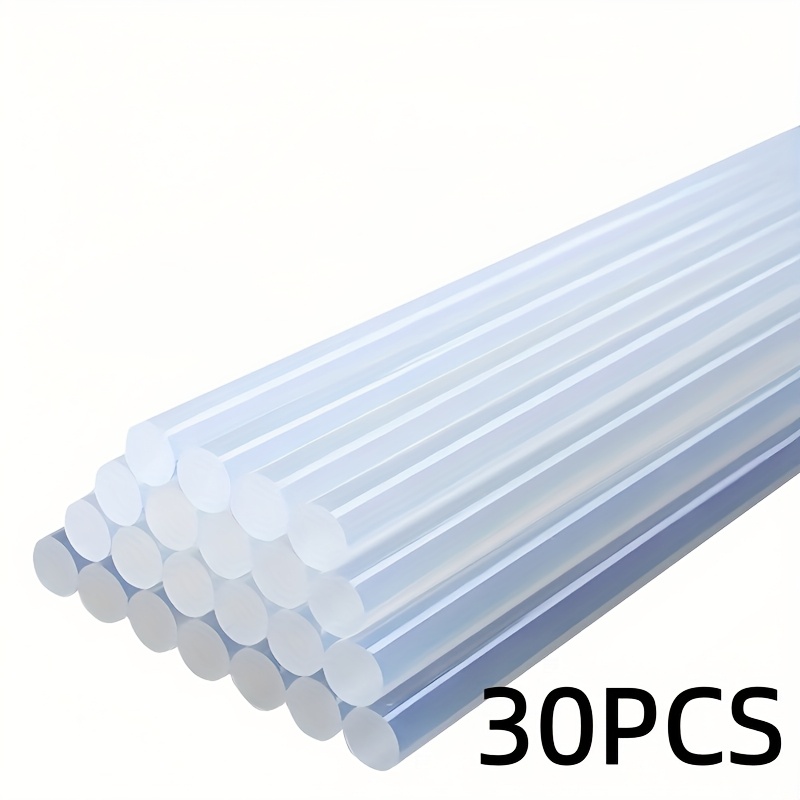 Image of A Set Of 30 Transparent Hot Melt Adhesive Sticks Measuring 11mm By 150mm, Ideal For High Applications. Perfect For Crafting, Home Repairs, Projects, And Sealing Packages