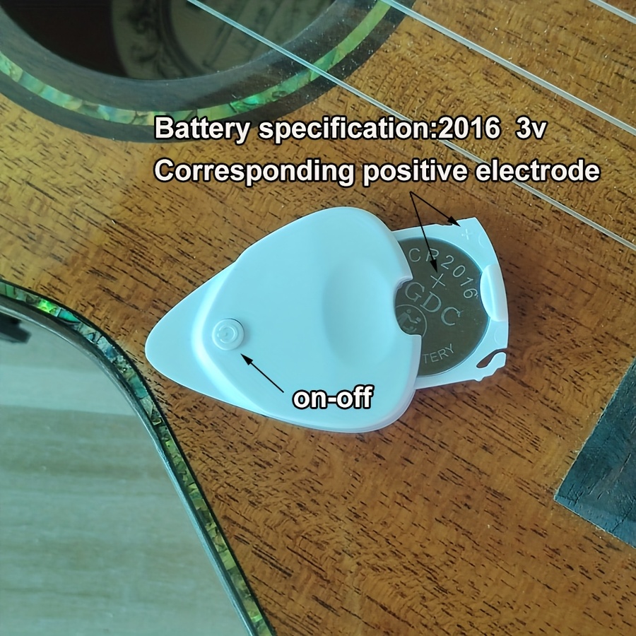 Dual-Purpose Instrument Tuner with Pick Function, Compact and Lightweight Design, Sensitive Sound Detection, 12-Tone Equal Temperament Mode Suitable for All Musical Instruments, Studio Equipment, Musical Instrument Tuning, Portable Tuner, Sleek Tuner, Durable Construction, Accurate Pitch Tool, Dualpurpose Tuner, Sound Detection Tuner, Piano Tuners, Musicians