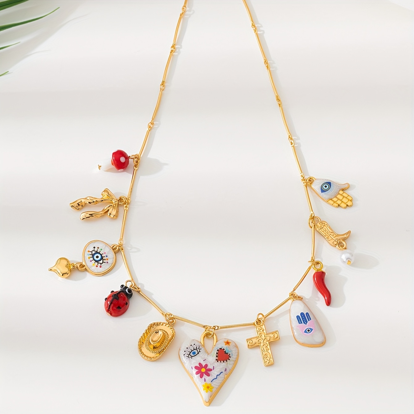 Sweet Funky Charm Necklace with Heart, Boot, Hat, and Eye Pendants