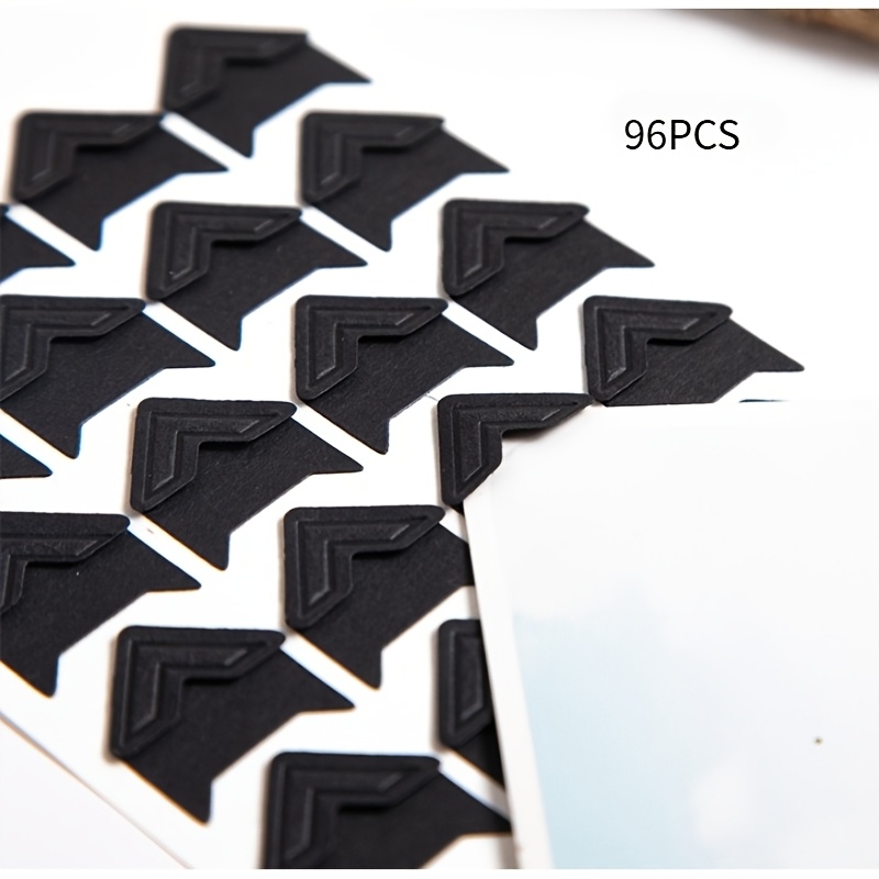 Self-adhesive Black Plastic Corners For Photos In Packs Of 48, 96, Or 240. Shiny, Irregularly Shaped Pieces Designed For Securing Pictures. Ideal For Scrapbooks And Photo Albums