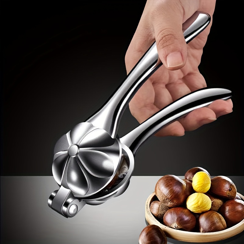 

A Kitchen Utensil Made Of Stainless Steel For Quickly Cracking Chestnuts And Walnuts.