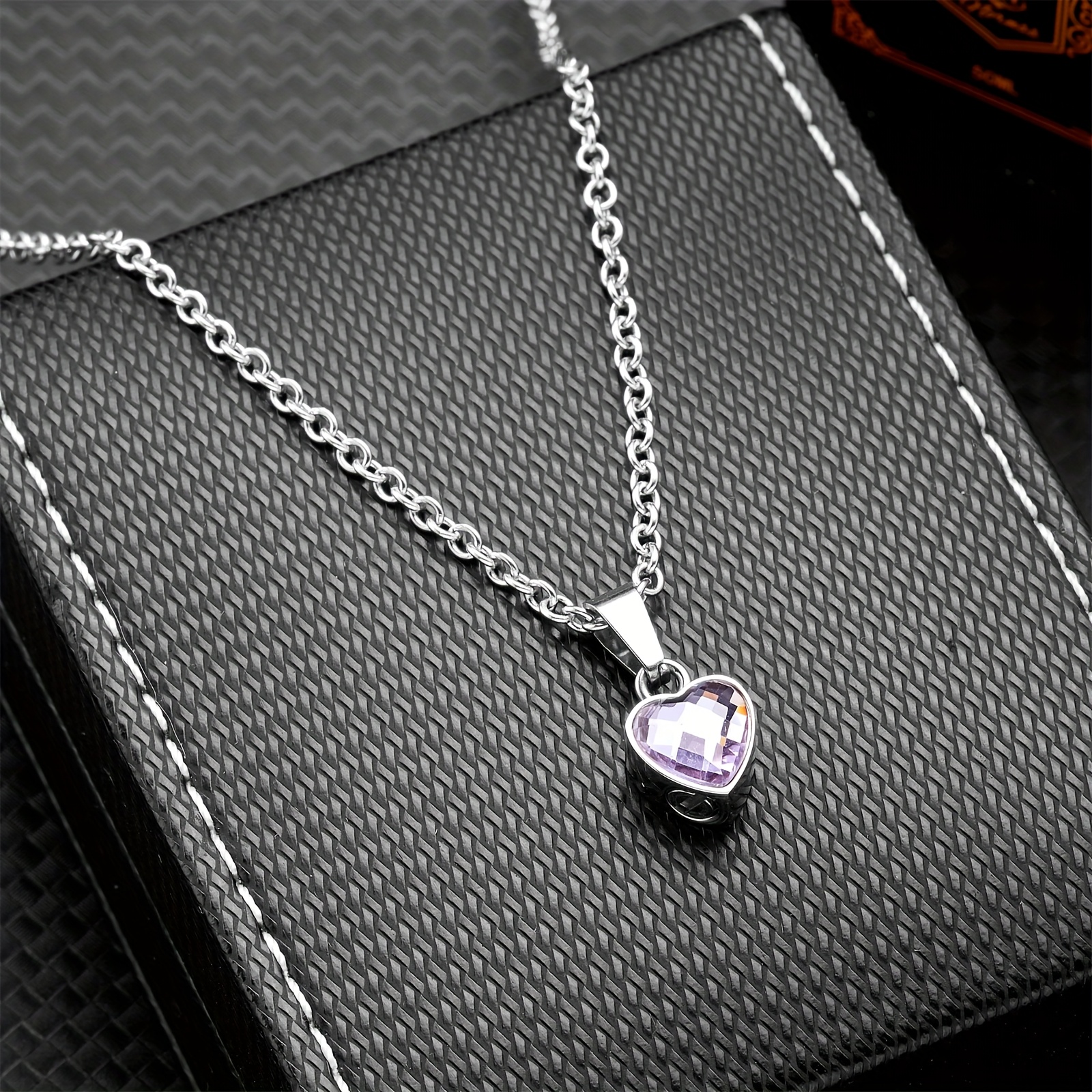 A Stainless Steel Birthstone Glass Ash Pendant a Stylish