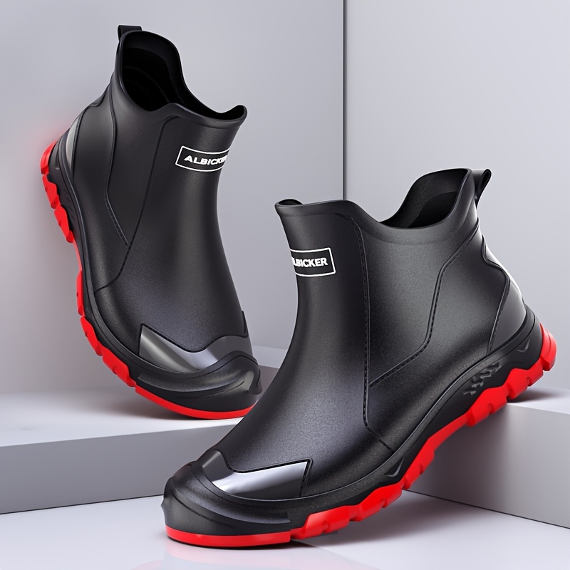 unisex black waterproof rain boots with red accents slip on rubber outsole comfortable fabric lining ideal for outdoor activities   and casual wear slipon shoes classic boot design comfortable lining waterproof shoes