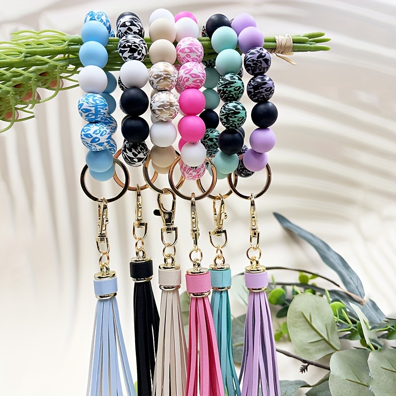 

Leopard Silicone Wooden Beaded Keychain With Pu Leather Tassel Fashion Bag Charm Phone Lanyard Bangle Keychain Women Daily Use Gift