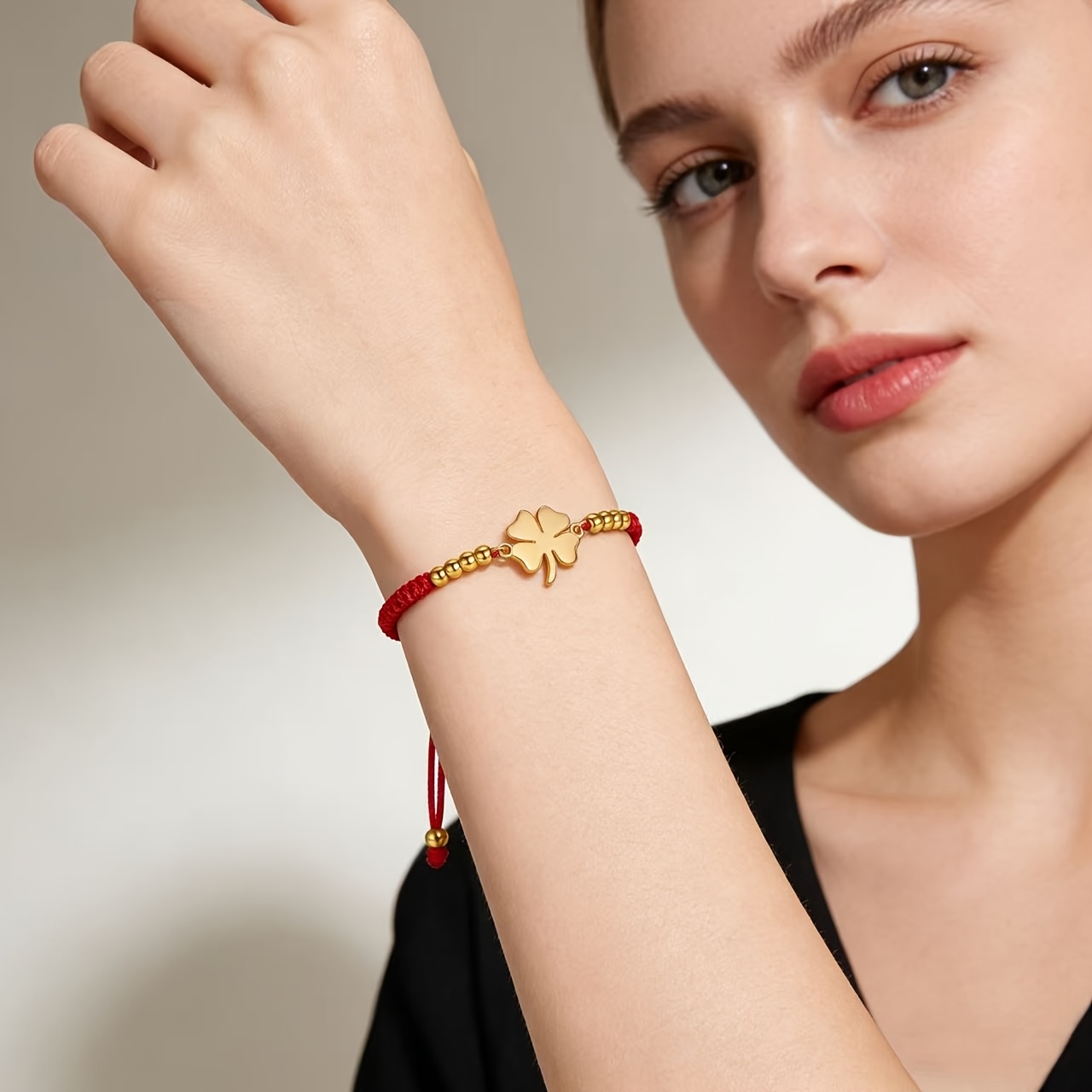 Red/Black Braided Rope Bracelet with Golden Clover Pendant