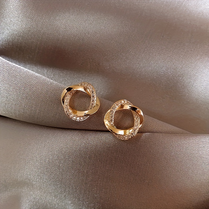 Alloy Circle Stud Earrings with Rhinestone Detailing and Stainless Steel Post