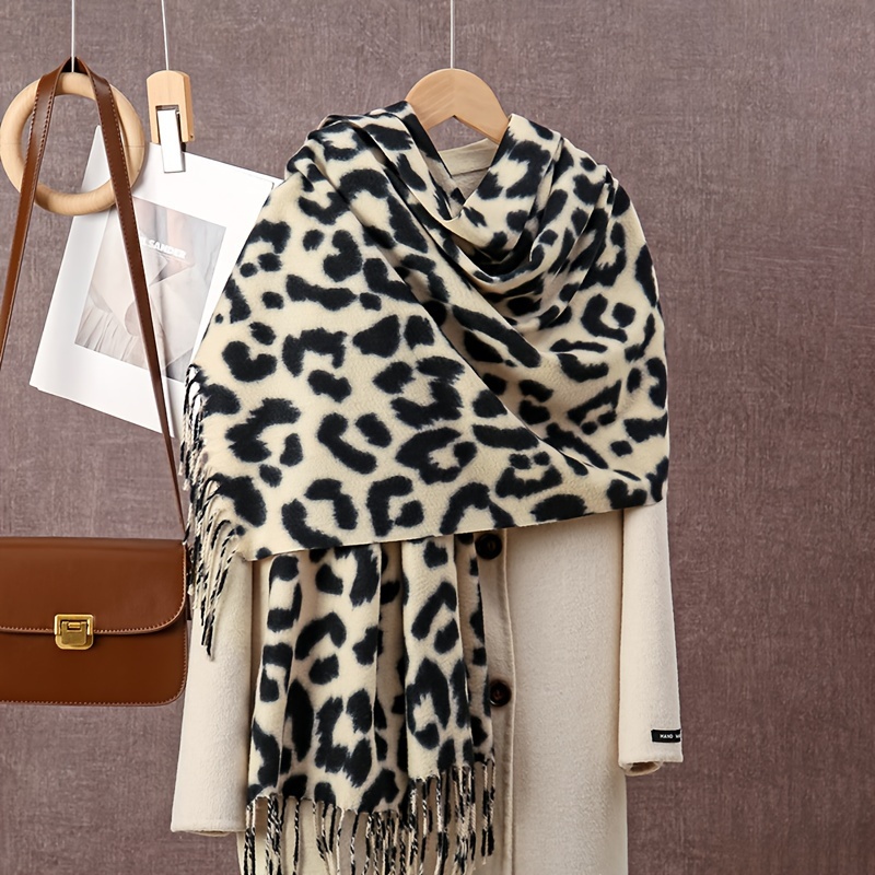 Image of Elegant Leopard Print Tassel Scarf - Cozy, Windproof Polyester Shawl With Fringe Detail, Machine Washable For Stylish Outdoor