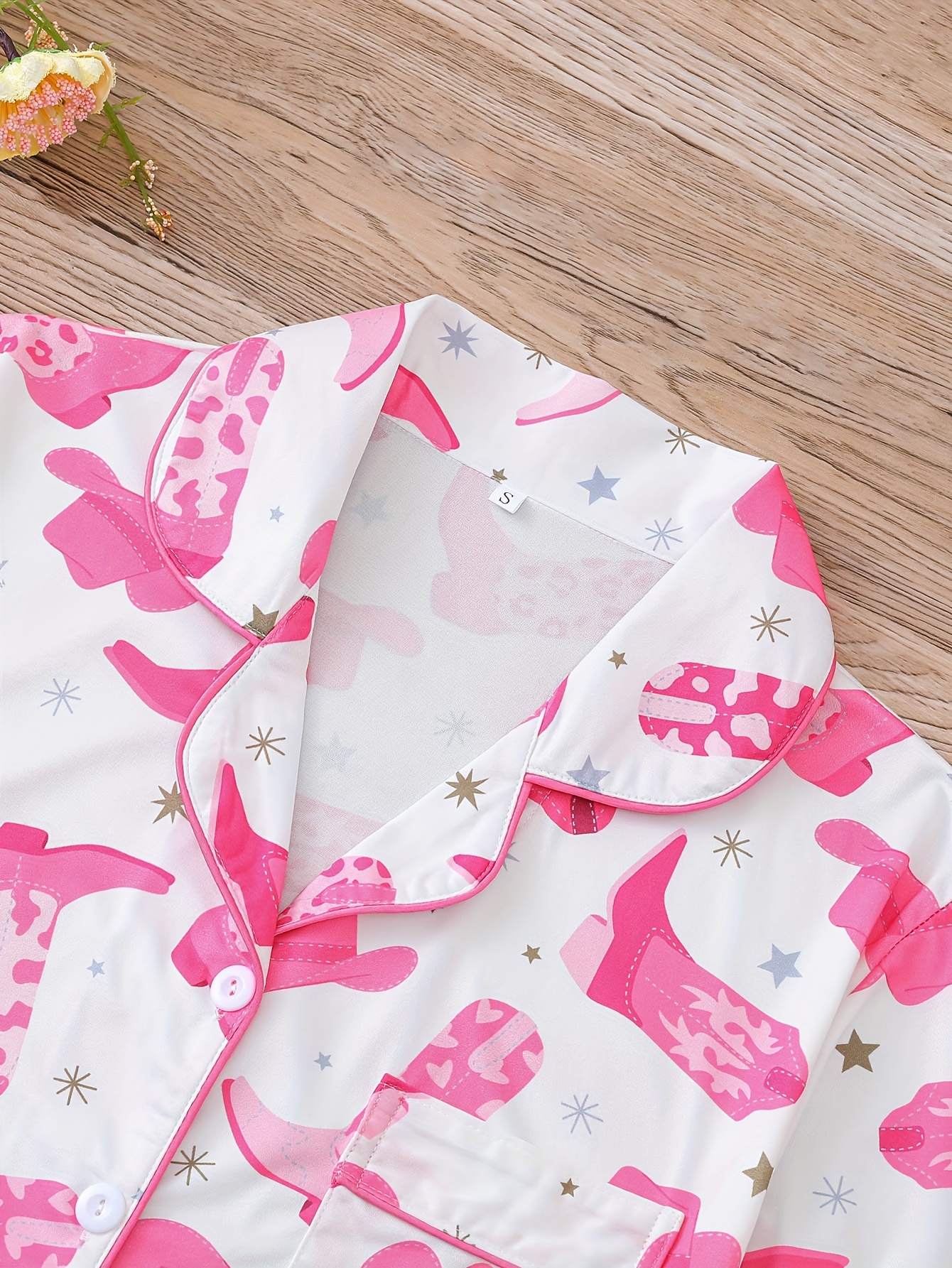 two sets of womens sleepwear sets   of womens sleepwear sets fabric short sleeved button up top and matching shorts full body print collar and pocket details suitable for womens adult sleepwear sets Product details 1