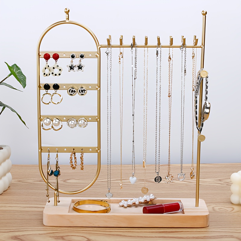 Portagioie minimalista con barra a T, noce e metallo, organizer