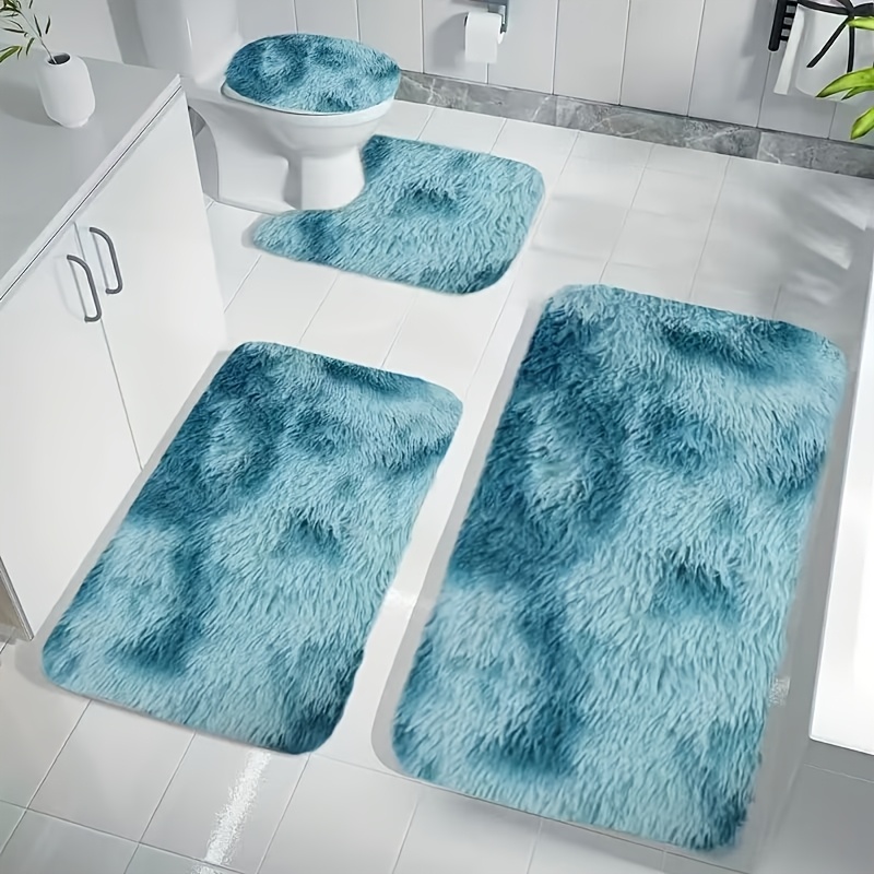 Luksuzni 4-delni mehkih preprog za notranje v tehniki tie-dye, z elegantnim pravokotnim dizajnom in U-oblikovanim . Idealne za kopalnice in