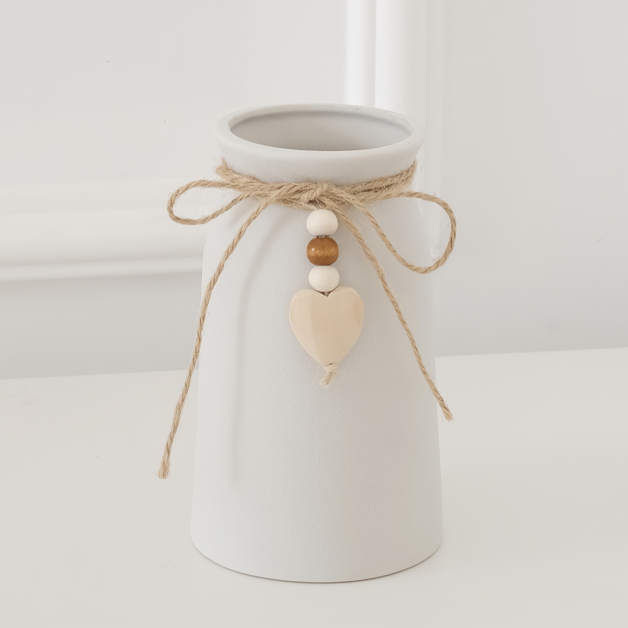 This 6-inch Ceramic Vase Is Designed, Showcasing Smooth, Rounded And Beautifully Embellished With A Heart-shaped Pendant -woven Jute Rope
