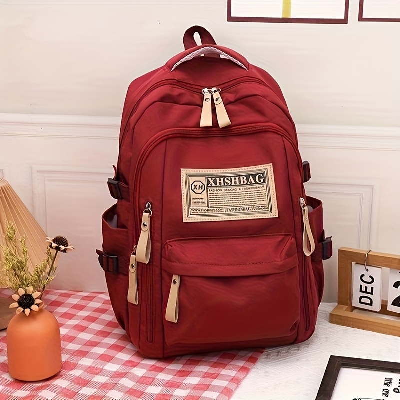 red casual backpack with adjustable shoulder straps multiple pockets lightweight durable polyester for travel school daily   stylish functional design daily   bag minimalist backpack lightweight bag details 6