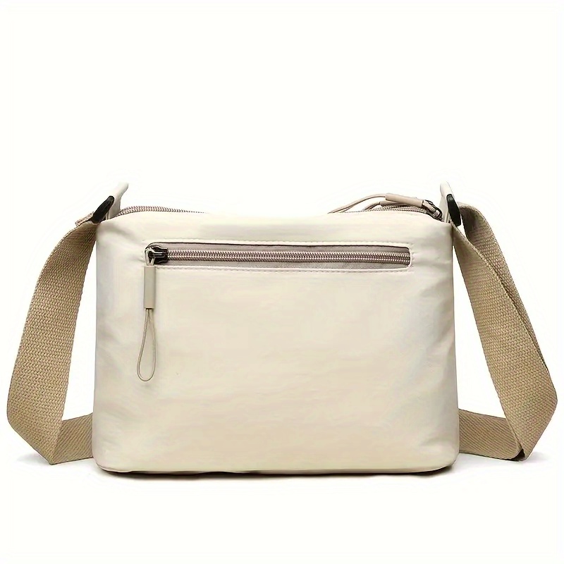 womens large capacity high quality casual solid color crossbody bag with adjustable shoulder strap and zipper closure elegant gray white   canvas bag with compartments for organized storage inside Product details 3
