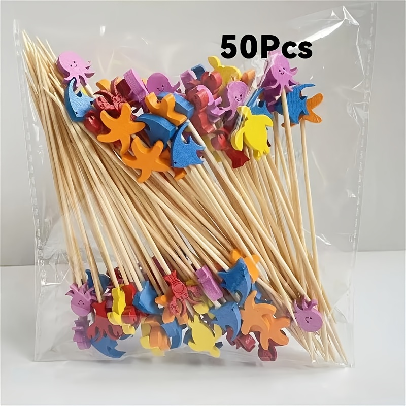 Image of Set Of 50 Bamboo Cocktail Picks Featuring Assorted Designs Like Octopuses, Sea Turtles, And Fish, Perfect For Appetizers At An -themed Birthday Or Baptism Celebration, And Great For Cake Decoration